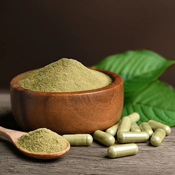 Close up shot of green powder and supplements