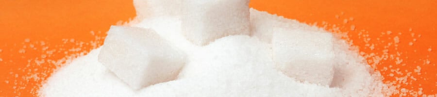 sugar grans in an orange background