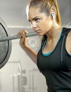serious lady in lifting weights